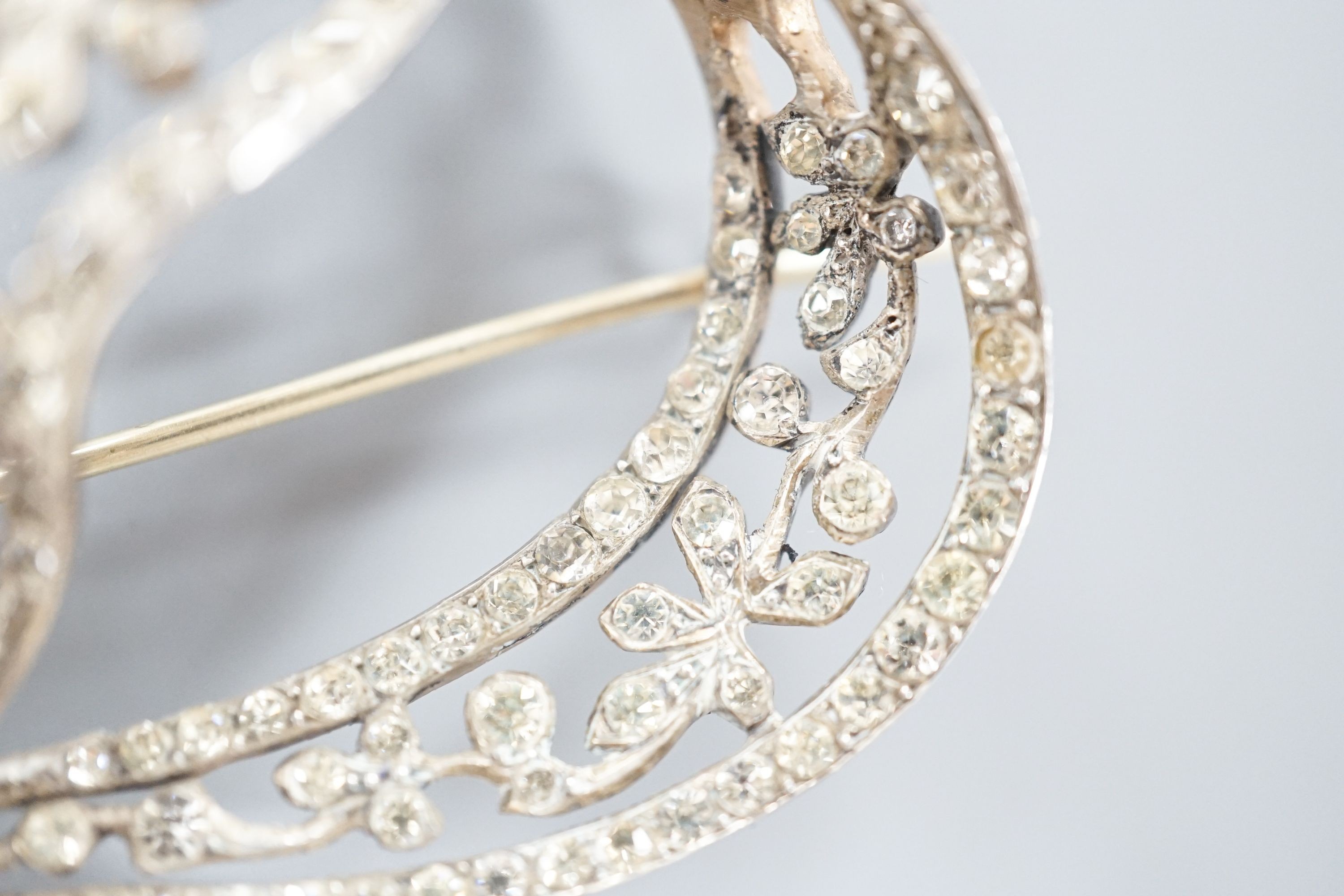 A sterling and paste set large ribbon bow brooch, width 95mm.